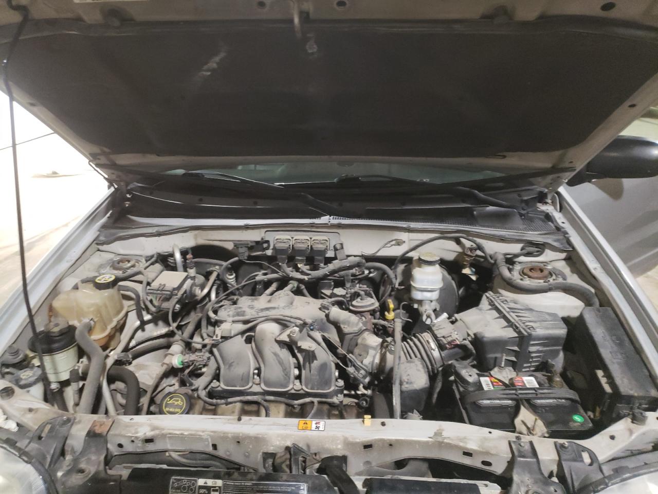 Photo 10 from auction – 2005 FORD ESCAPE LIM with VIN 1FMYU04165KA25955
