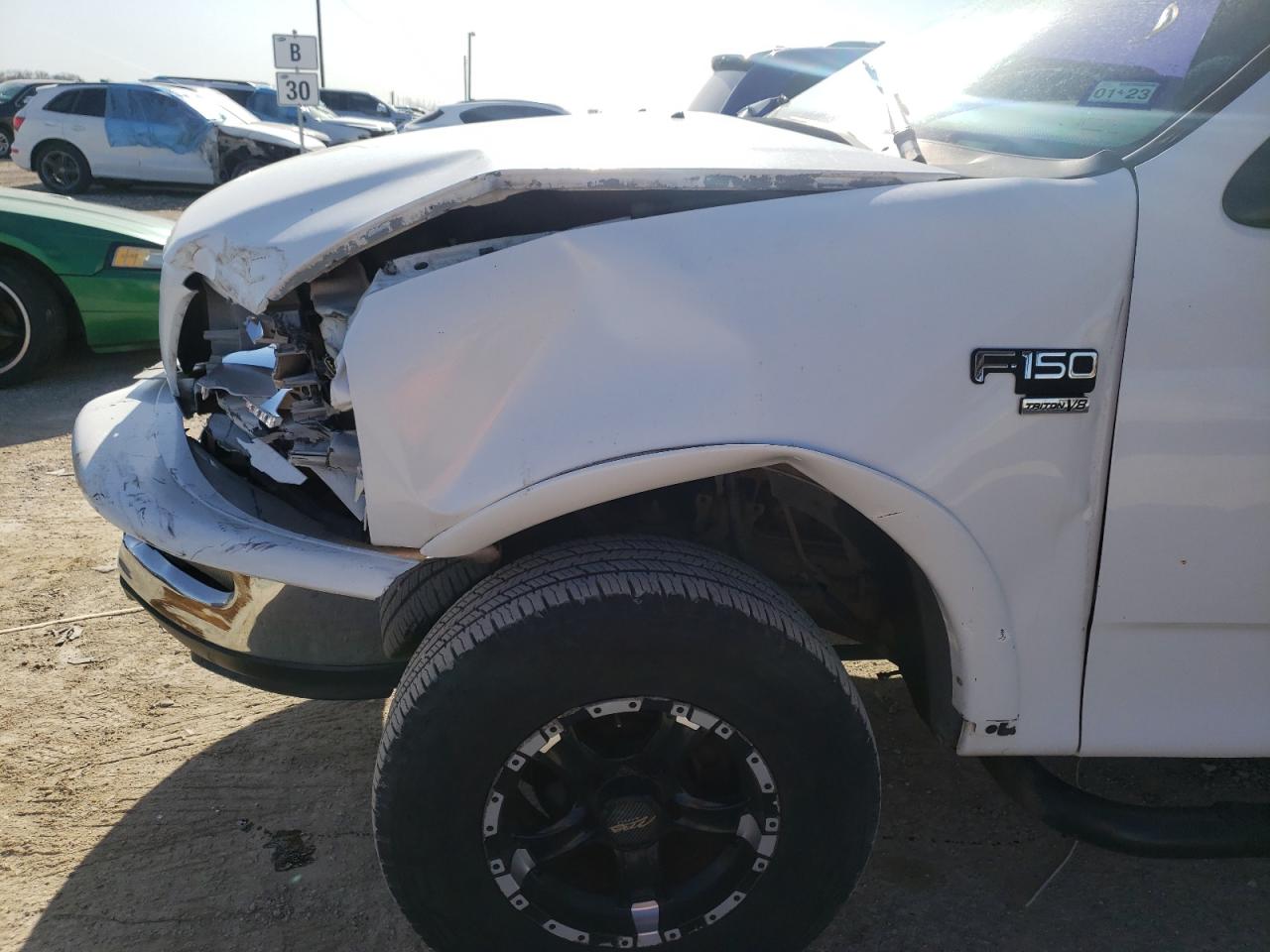 Photo 9 from auction – 1998 FORD F150 with VIN 1FTZX08W5WKB91164