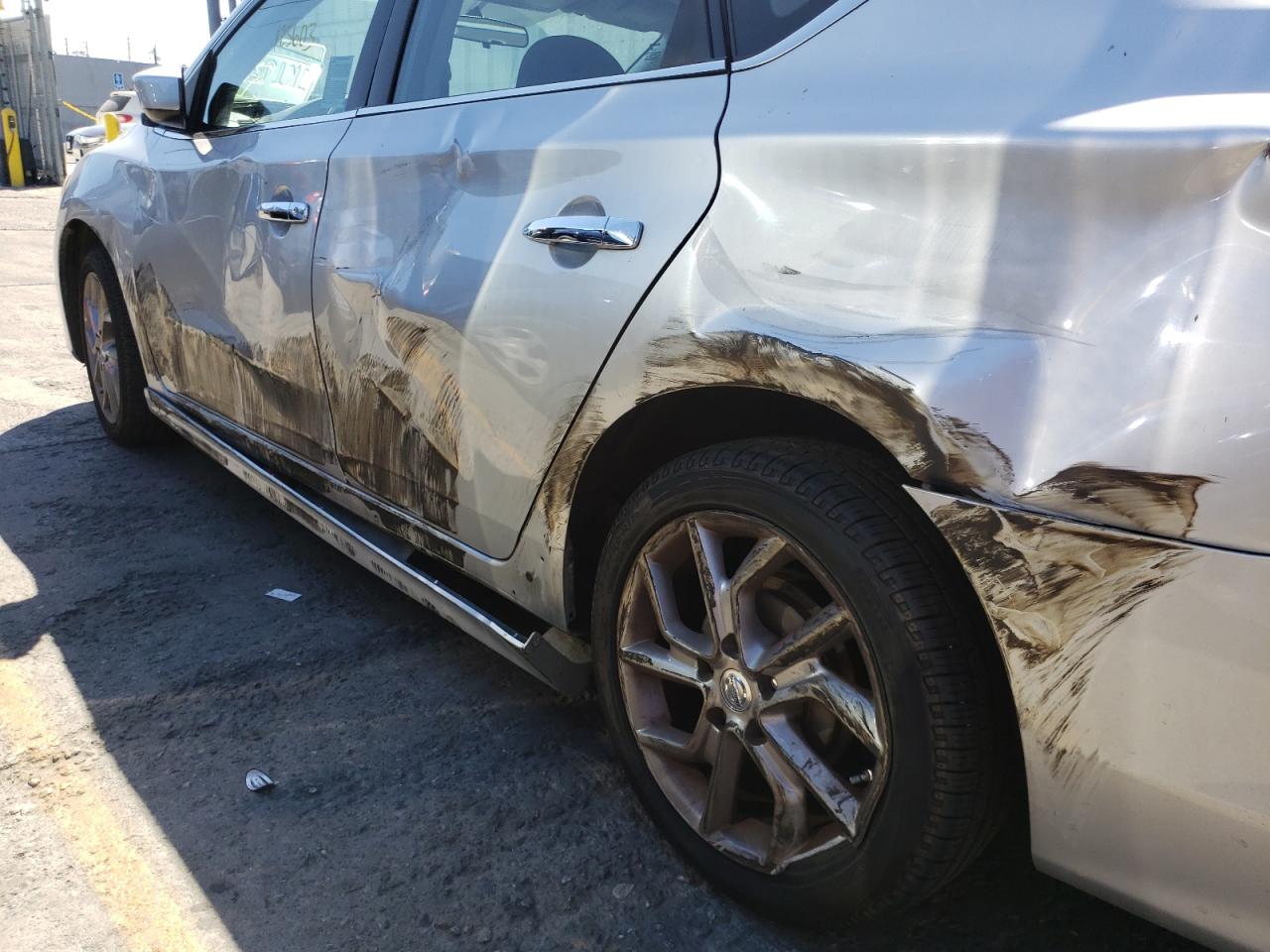 Photo 9 from auction – 2014 NISSAN SENTRA S with VIN 3N1AB7AP2EY342231