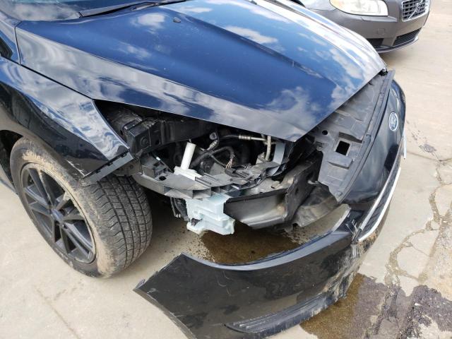 Photo 9 from auction – 2016 FORD FOCUS SE with VIN 1FADP3F22GL393120