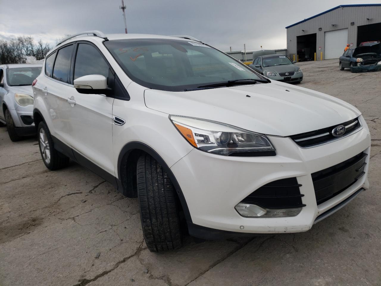FORD ESCAPE TIT 2016 with VIN 1FMCU9J92GUC46579 - Photo from auction