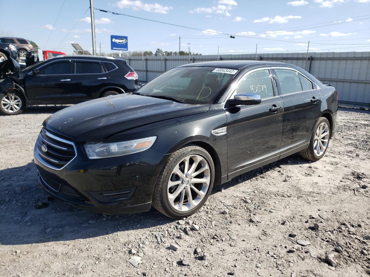 Photo 2 from auction – 2014 FORD TAURUS LIM with VIN 1FAHP2F85EG136202
