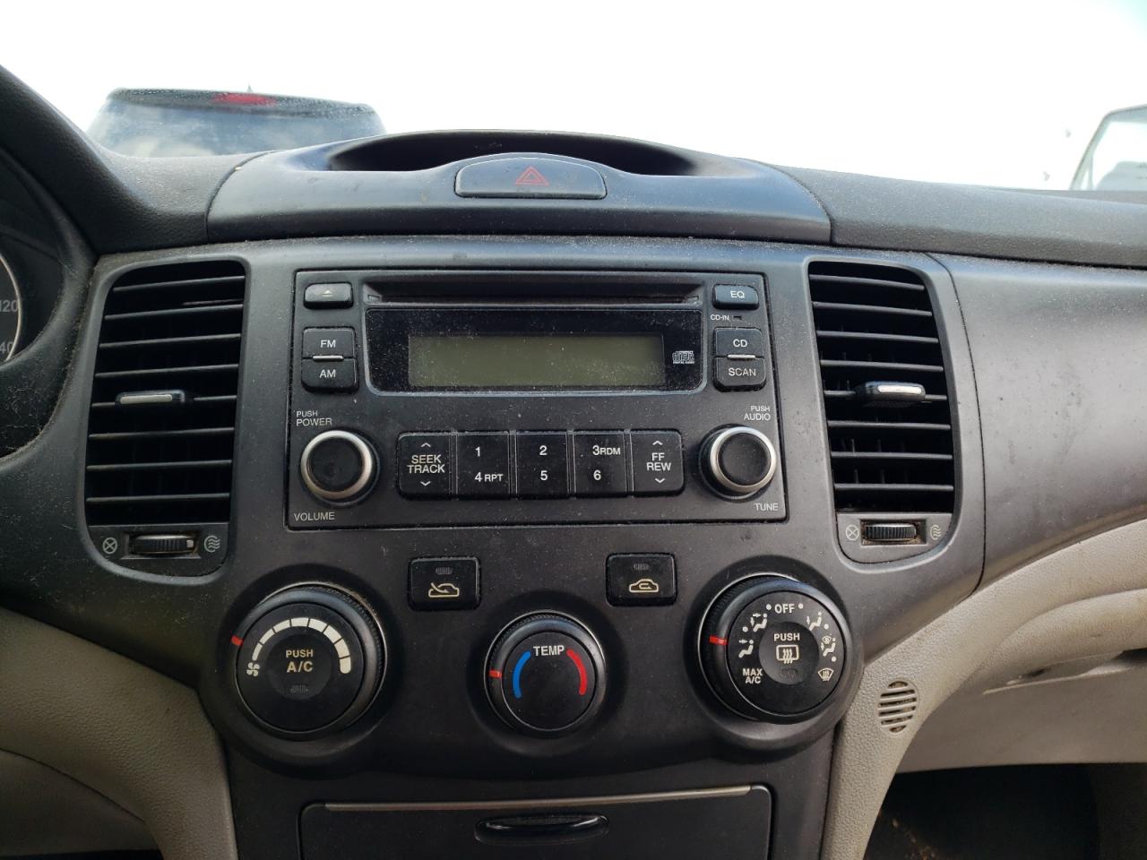 Photo 9 from auction – 2007 KIA OPTIMA LX with VIN KNAGE123375122956