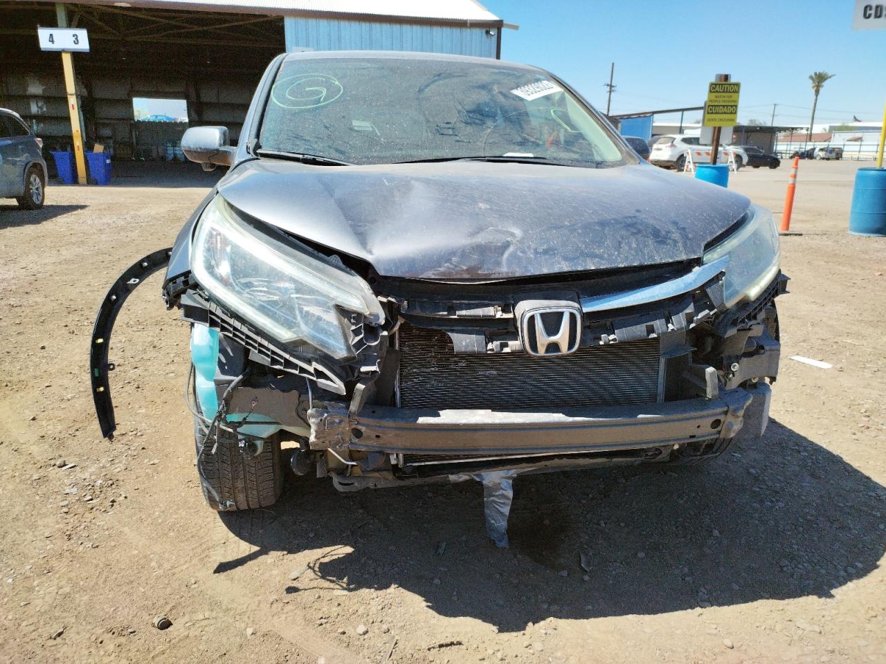 Photo 9 from auction – 2015 HONDA CR-V EX with VIN 2HKRM3H55FH541327