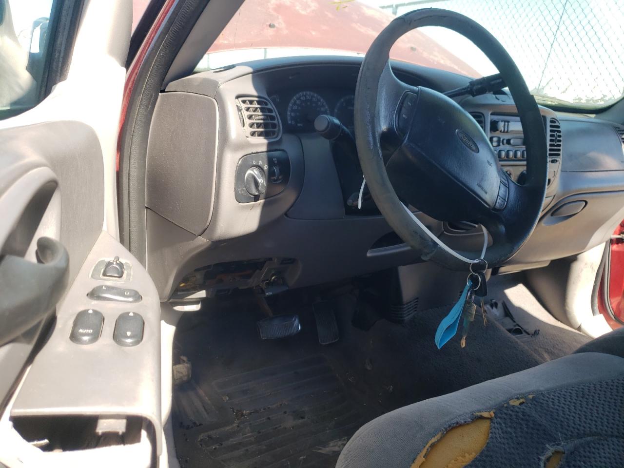 Photo 9 from auction – 1999 FORD F150 with VIN 1FTRX17W2XKB94757