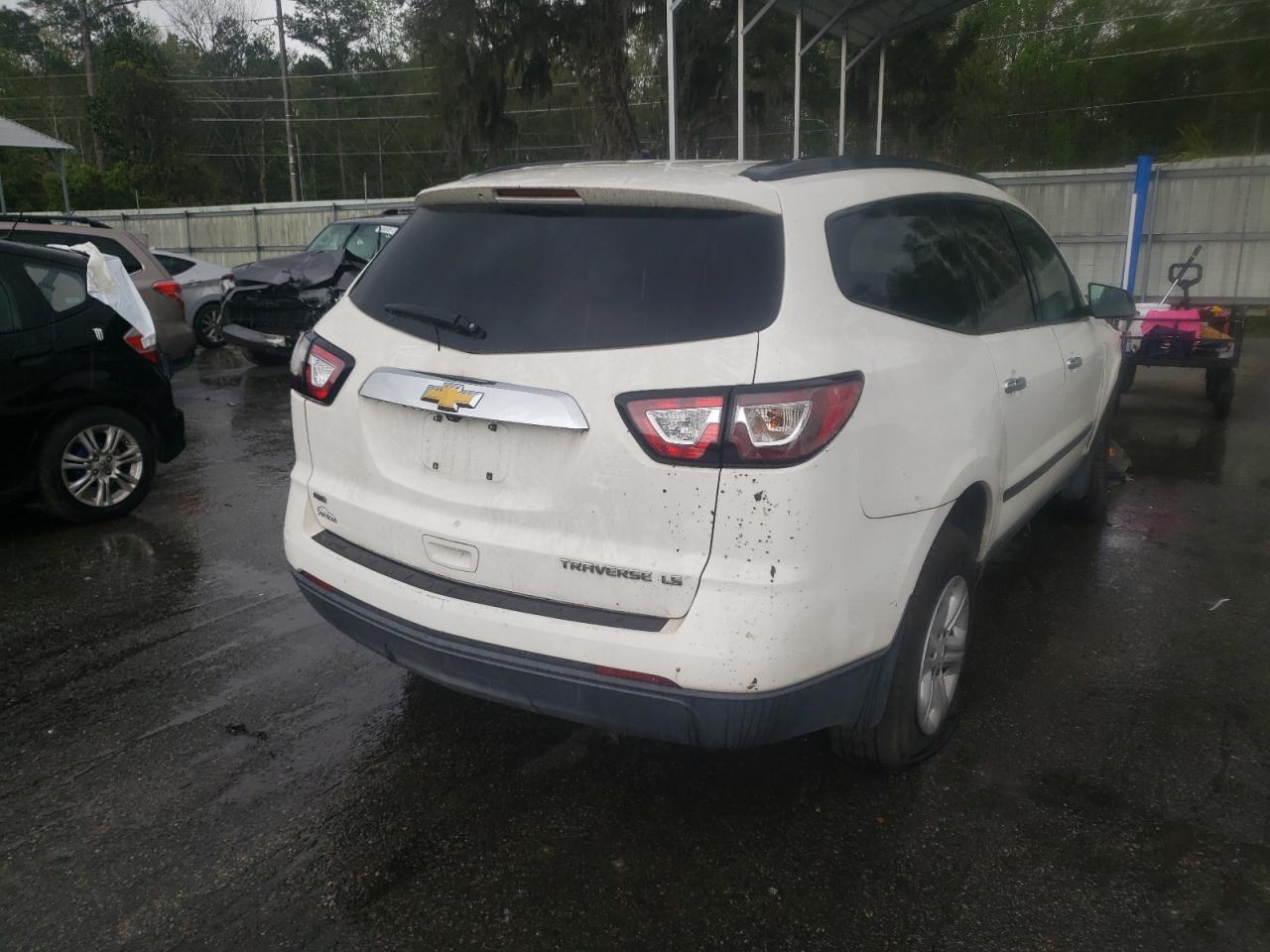 Photo 4 from auction – 2014 CHEVROLET TRAVERSE L with VIN 1GNKVFKD2EJ360943