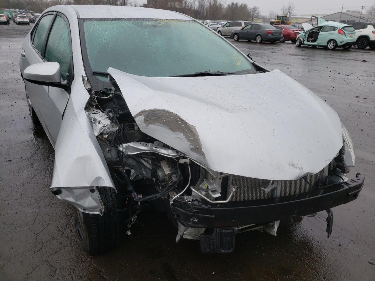 TOYOTA COROLLA L 2015 with VIN 2T1BURHE6FC234854 - Photo from auction