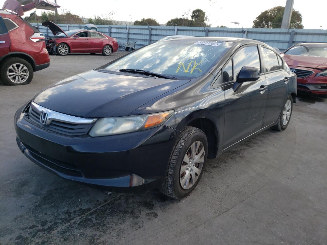 Photo 2 from auction – 2012 HONDA CIVIC LX with VIN 2HGFB2F55CH560195