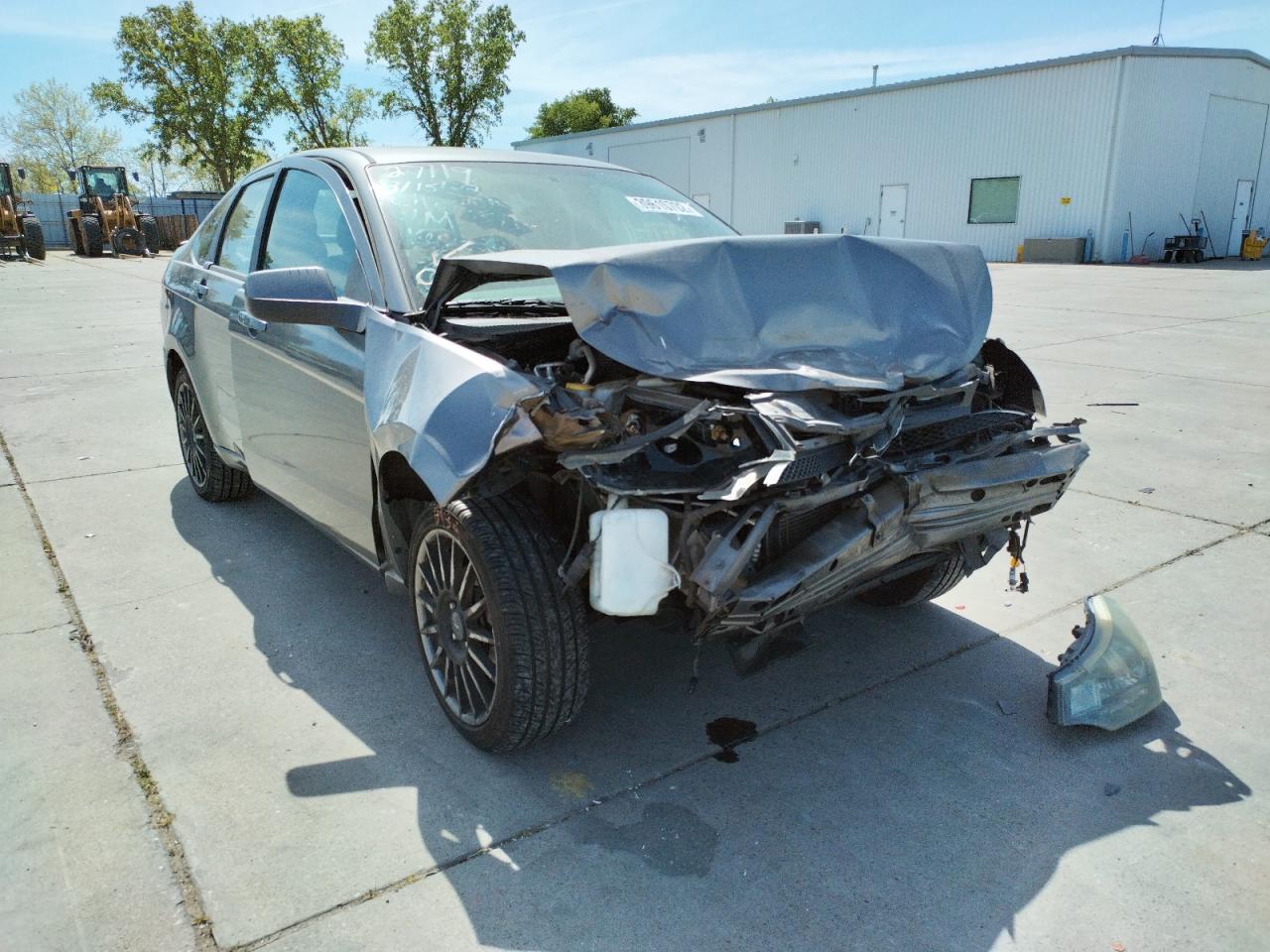 FORD FOCUS SES 2011 with VIN 1FAHP3GN0BW107878 - Photo from auction