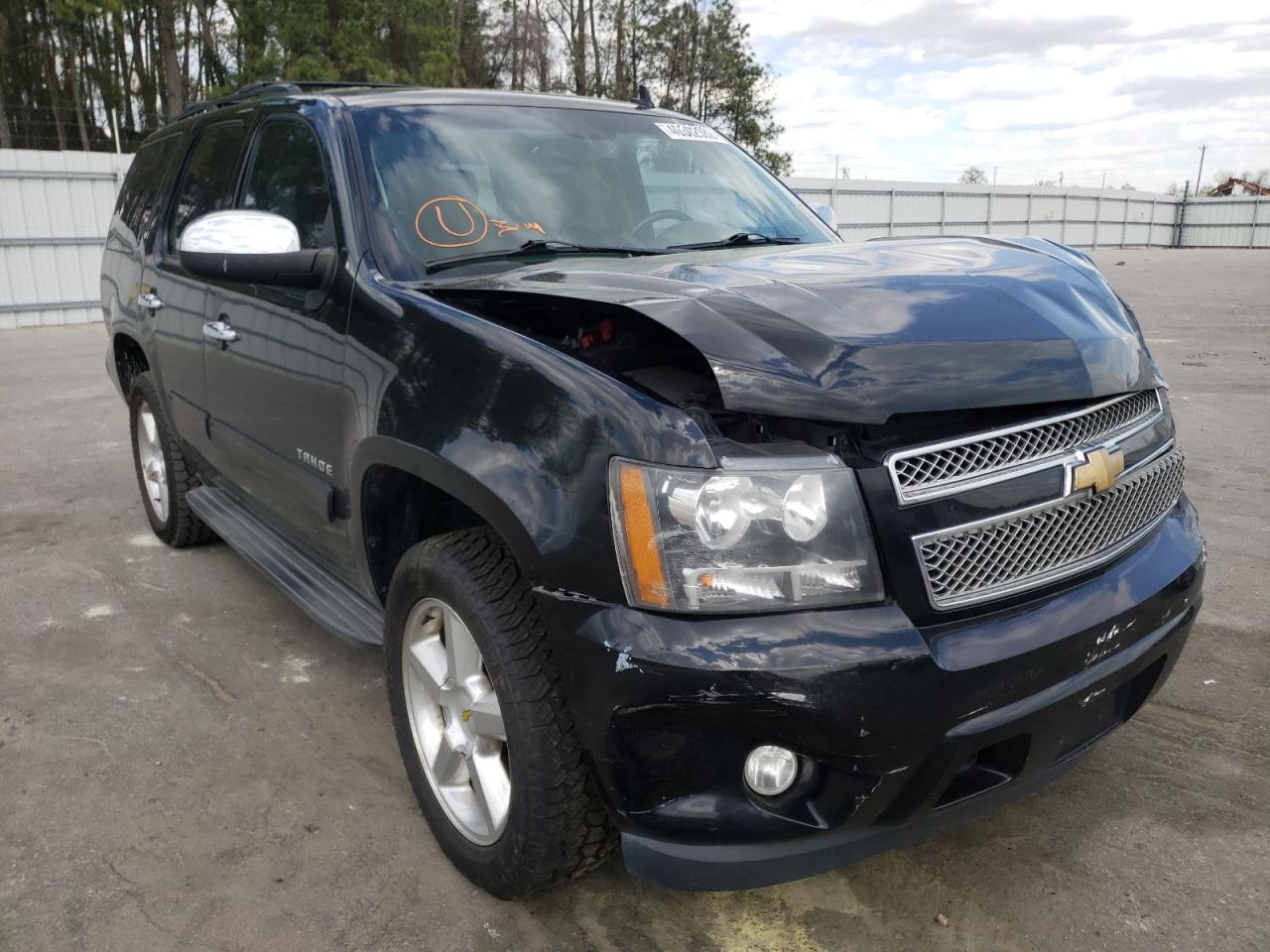 CHEVROLET TAHOE C150 2011 with VIN 1GNSCBE06BR248313 - Photo from auction