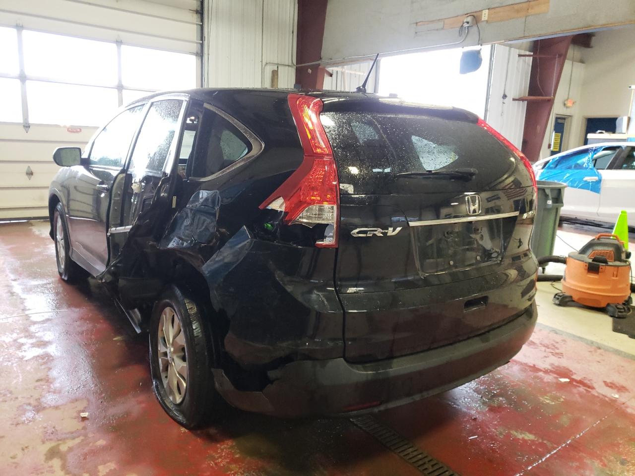 Photo 3 from auction – 2014 HONDA CR-V with VIN 5J6RM4H54EL086397