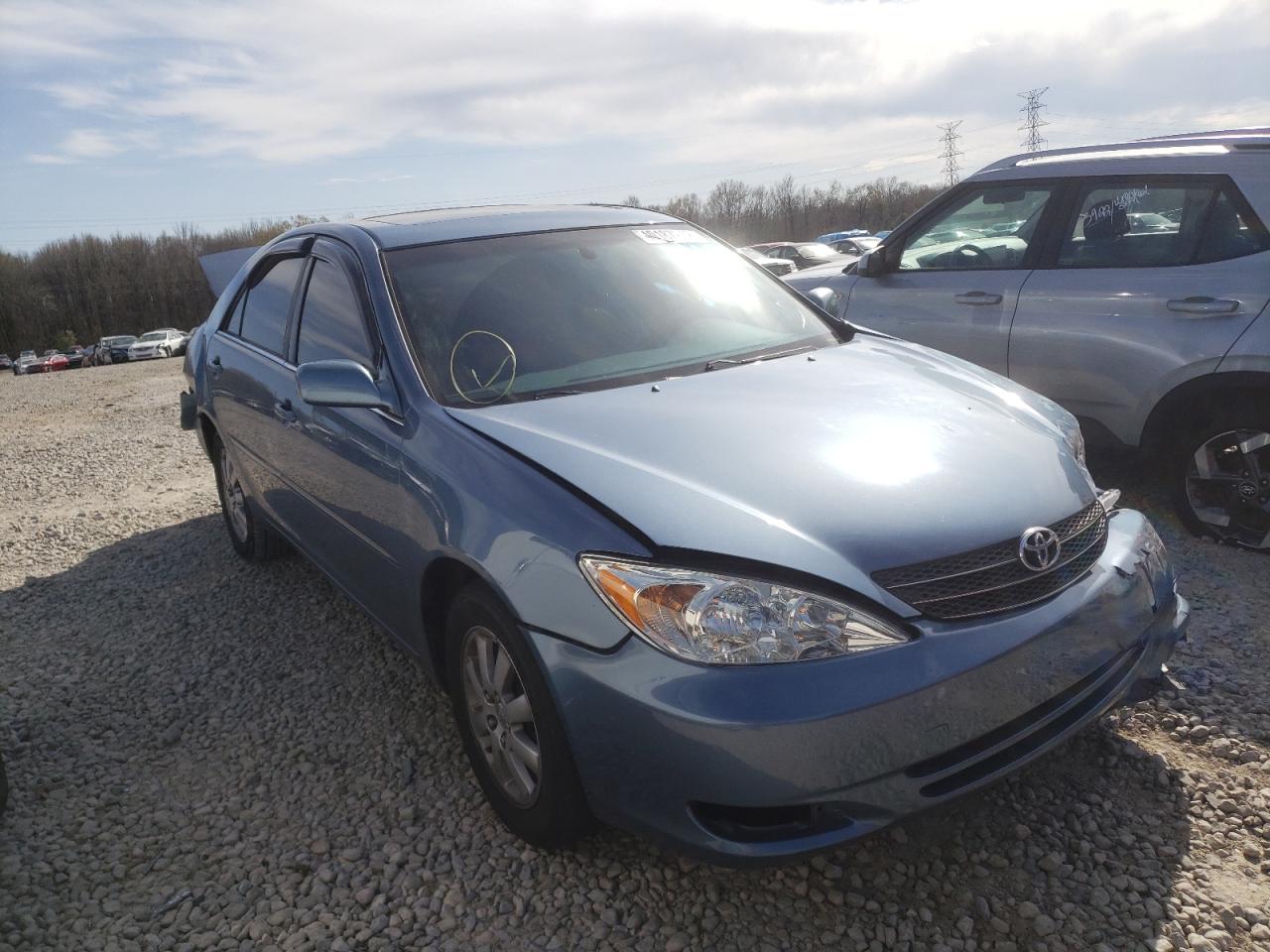 Photo 1 from auction – 2002 TOYOTA CAMRY LE with VIN JTDBE30K320050374