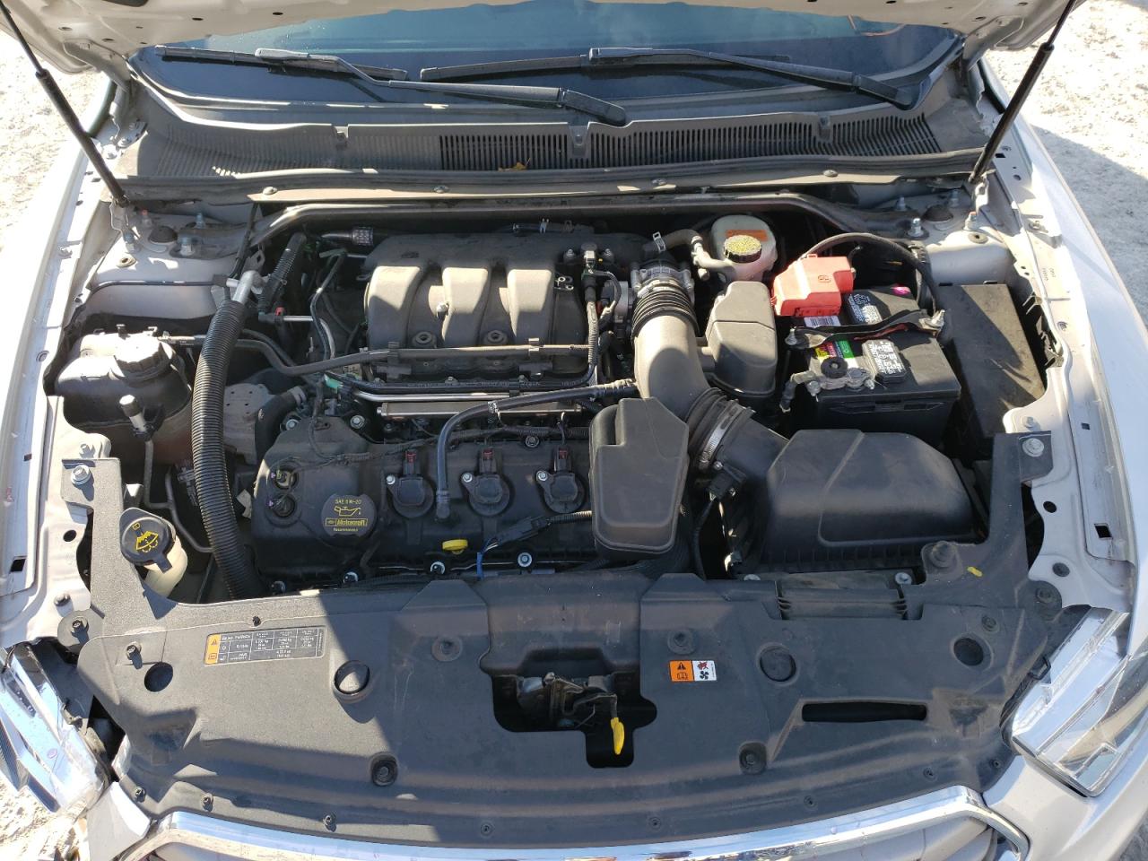 Photo 7 from auction – 2013 FORD TAURUS SEL with VIN 1FAHP2E80DG103043