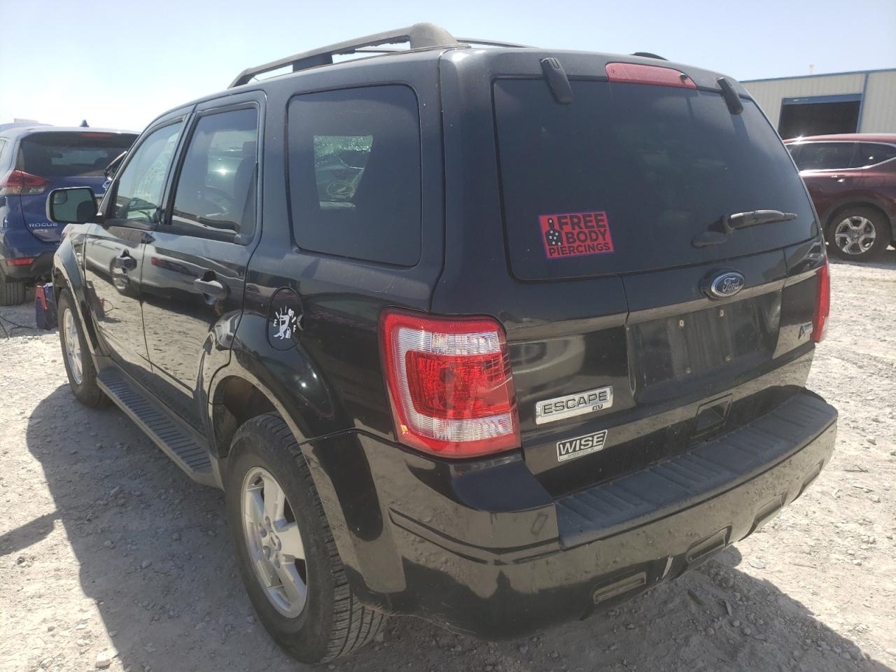 Photo 3 from auction – 2011 FORD ESCAPE XLT with VIN 1FMCU9DG2BKB85331
