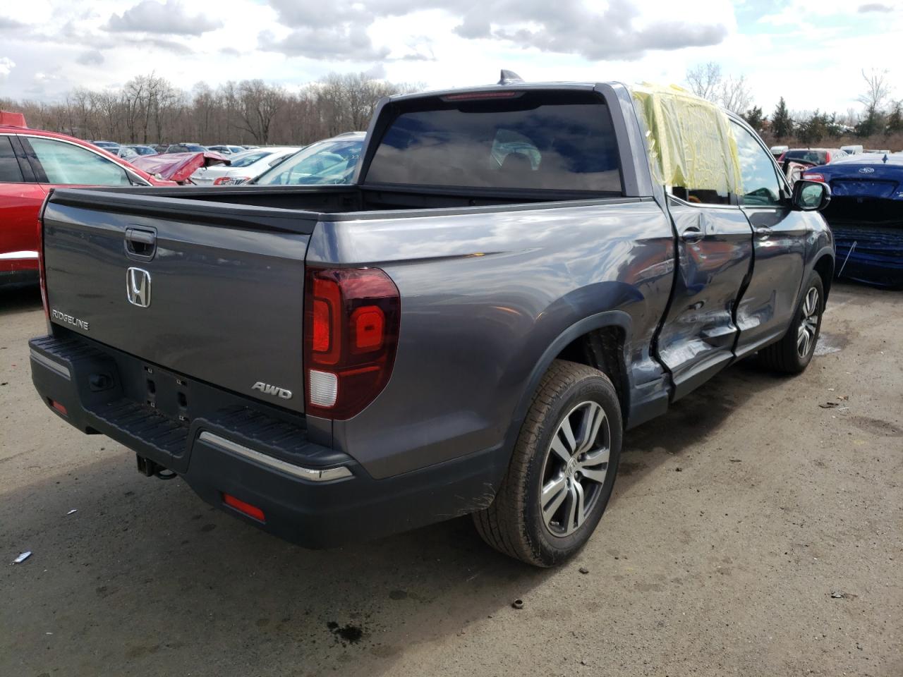 Photo 4 from auction – 2017 HONDA RIDGELINE with VIN 5FPYK3F42HB022076