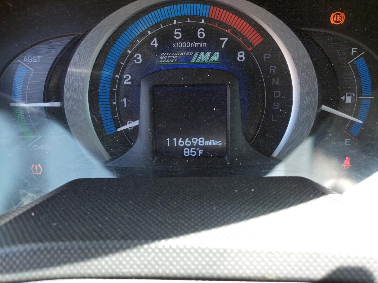 Photo 8 from auction – 2011 HONDA INSIGHT LX with VIN JHMZE2H59BS009175
