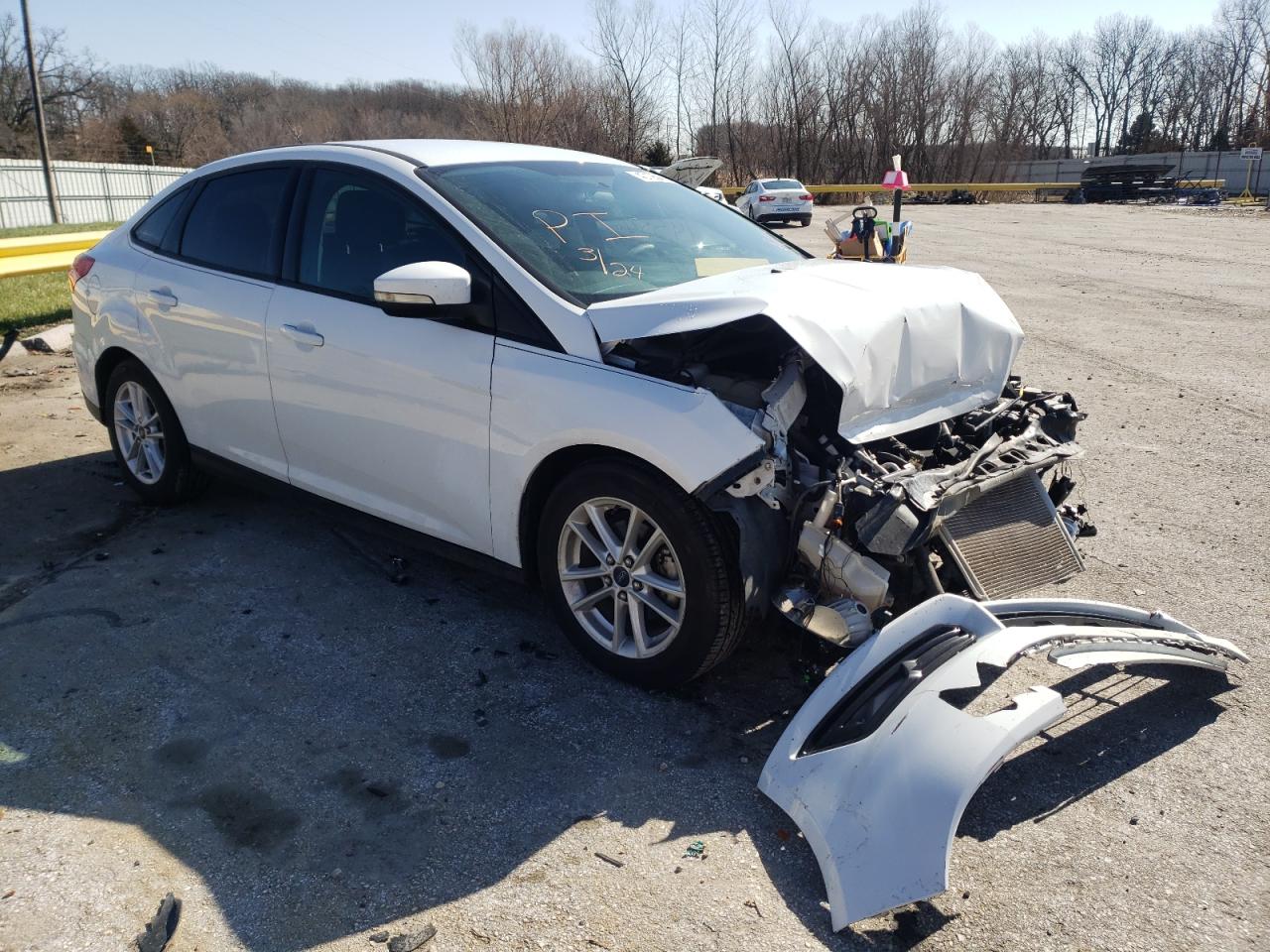 FORD FOCUS SE 2015 with VIN 1FADP3F25FL384295 - Photo from auction