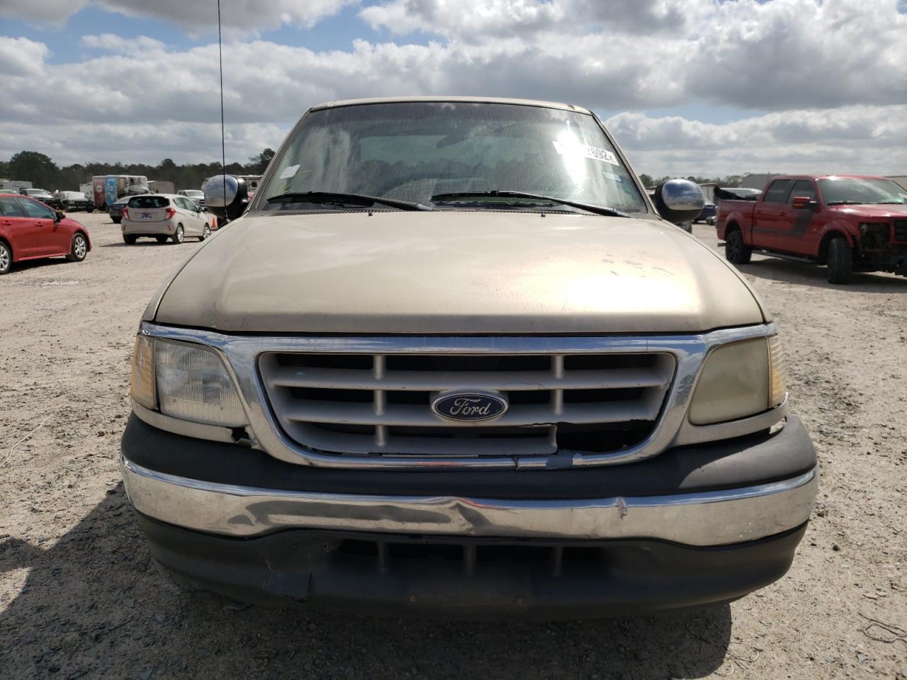 Photo 9 from auction – 1999 FORD F150 with VIN 1FTRX07W2XKC02110