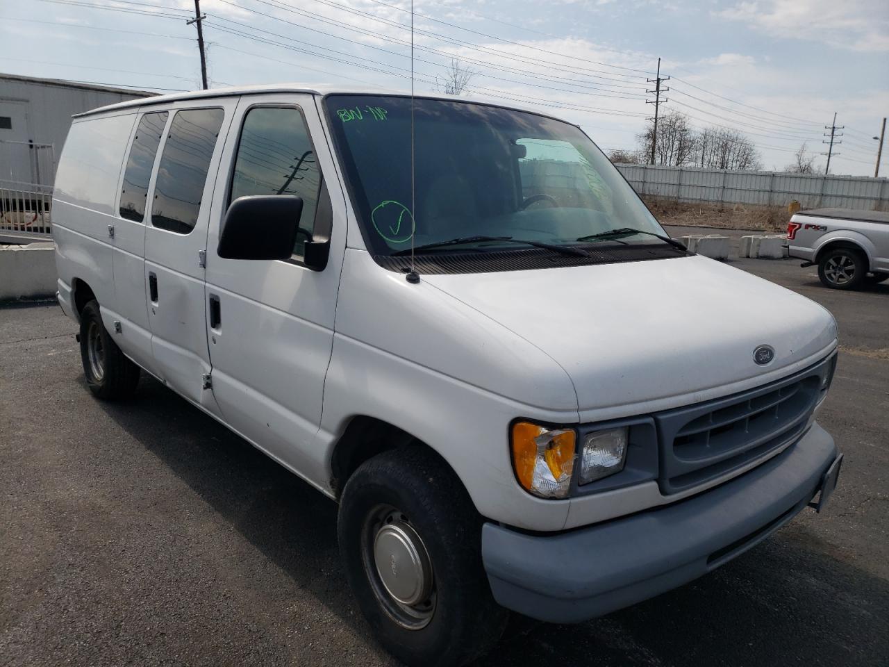 FORD ECONOLINE 1999 with VIN 1FTRE1423XHA72199 - Photo from auction