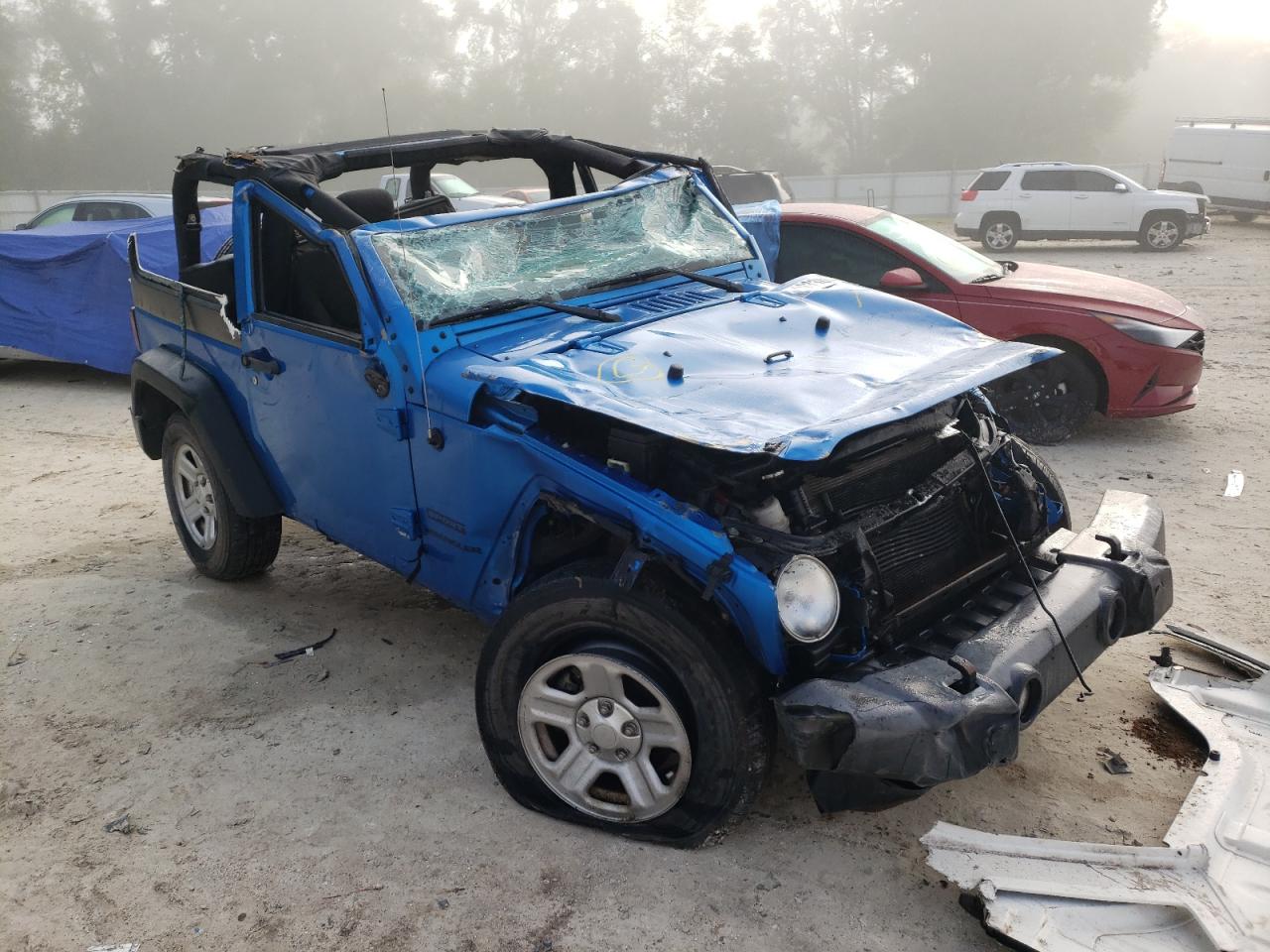 JEEP WRANGLER S 2016 with VIN 1C4AJWAG9GL209388 - Photo from auction