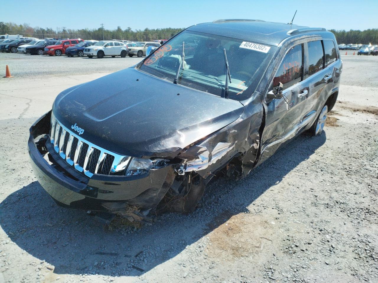 Photo 2 from auction – 2013 JEEP GRAND CHER with VIN 1C4RJFCTXDC583694