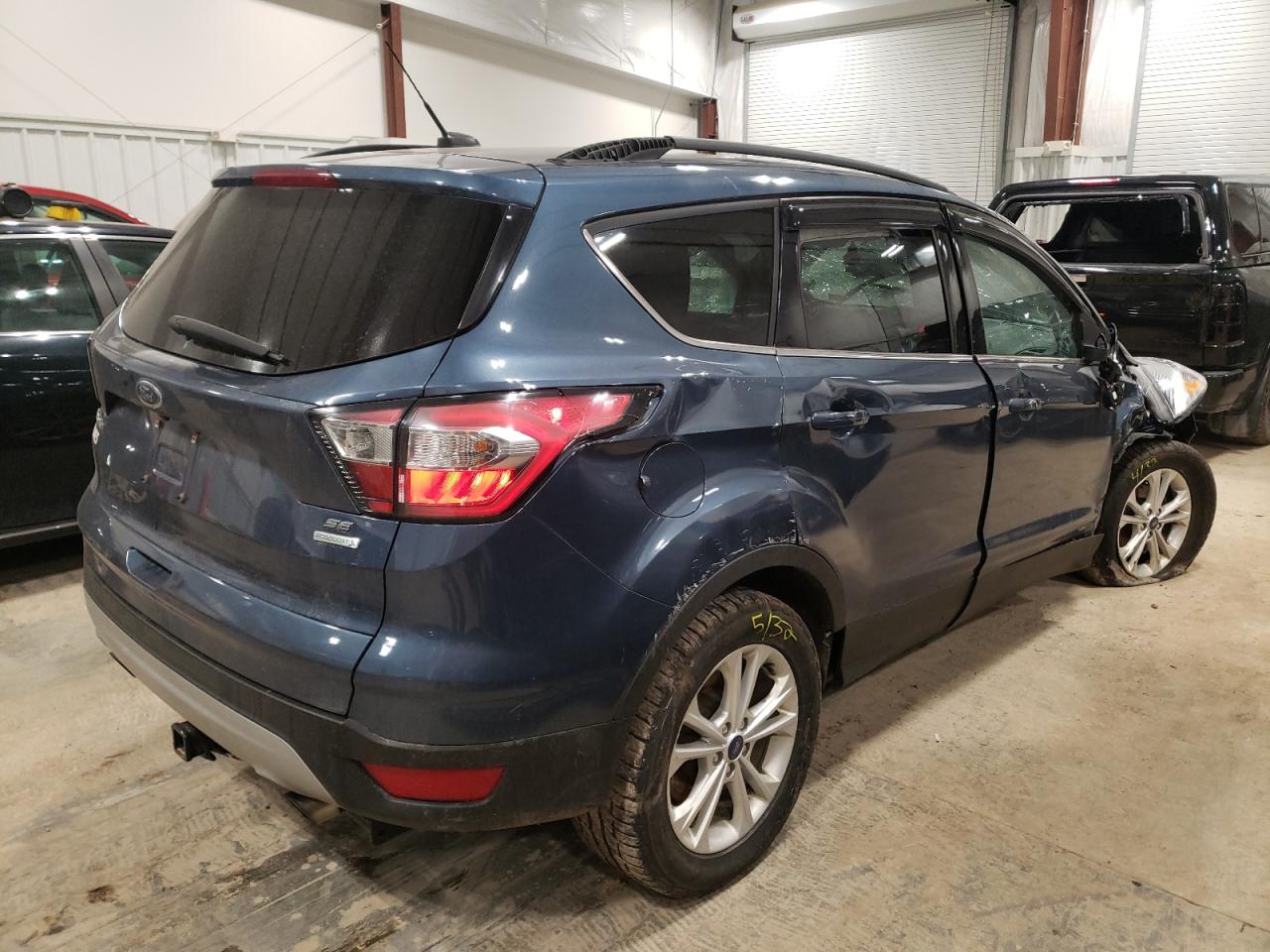 Photo 4 from auction – 2018 FORD ESCAPE SE with VIN 1FMCU0GD2JUC90189