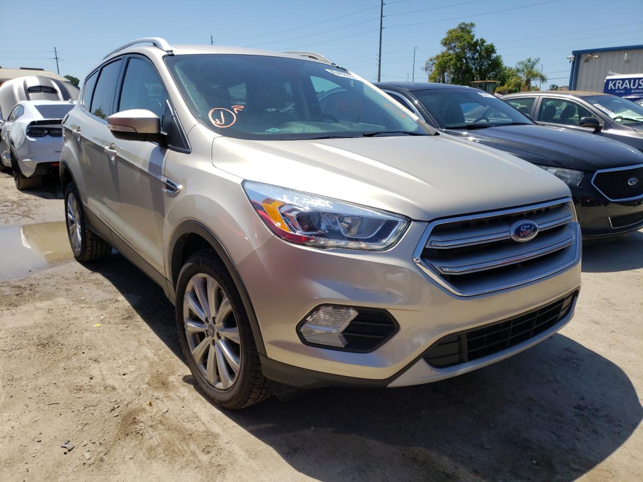 FORD ESCAPE TIT 2017 with VIN 1FMCU9JD0HUC86505 - Photo from auction
