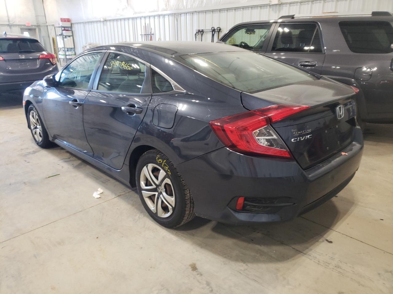 Photo 3 from auction – 2016 HONDA CIVIC LX with VIN 19XFC2F52GE065899