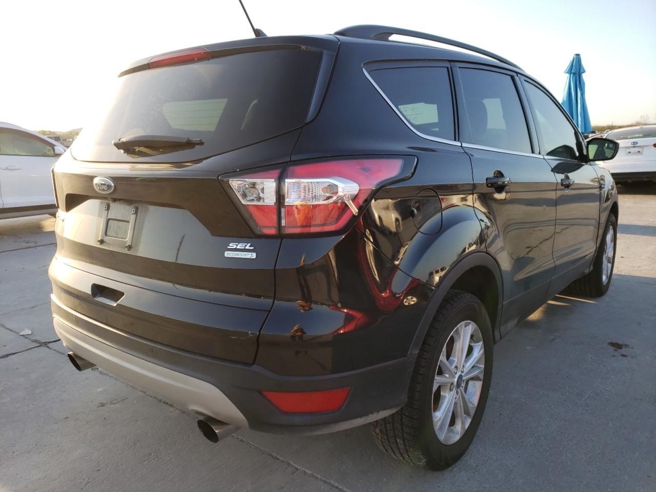 Photo 4 from auction – 2018 FORD ESCAPE SEL with VIN 1FMCU0HD7JUA71209