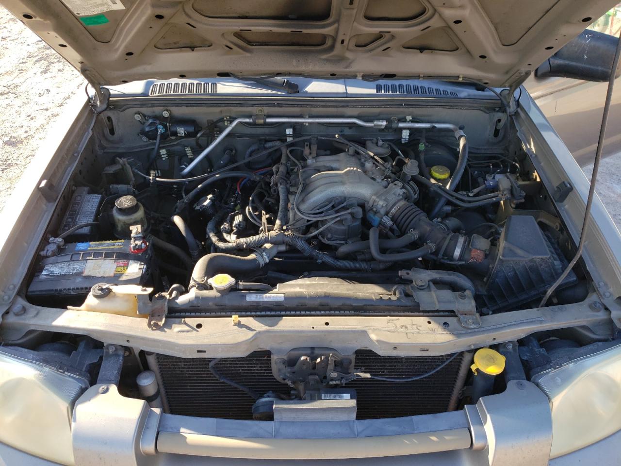 Photo 7 from auction – 2004 NISSAN FRONTIER C with VIN 1N6ED29X84C482319