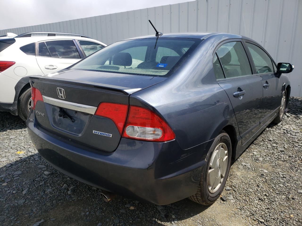 Photo 4 from auction – 2010 HONDA CIVIC HYBR with VIN JHMFA3F28AS005081