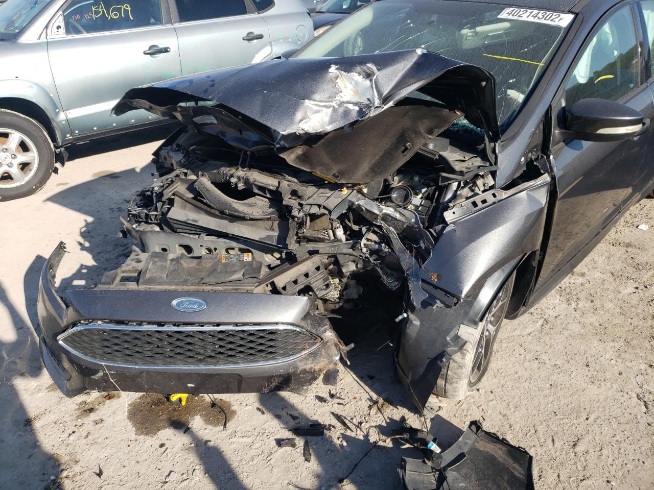 Photo 20 from auction – 2015 FORD FOCUS SE with VIN 1FADP3F28FL214397