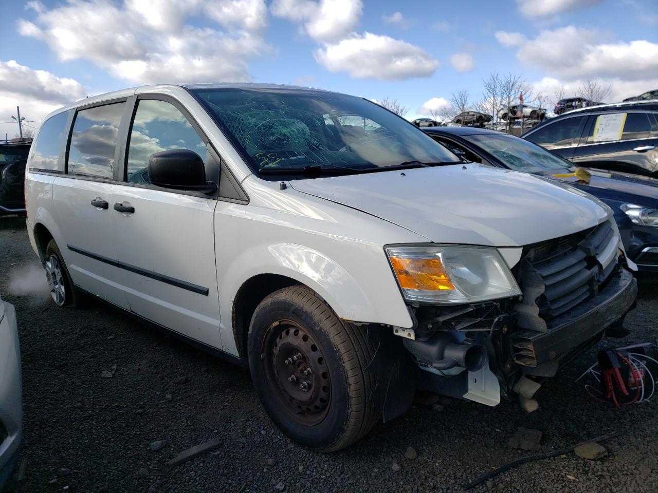 DODGE GRAND CARA 2009 with VIN 1D4HN11E69B519952 - Photo from auction
