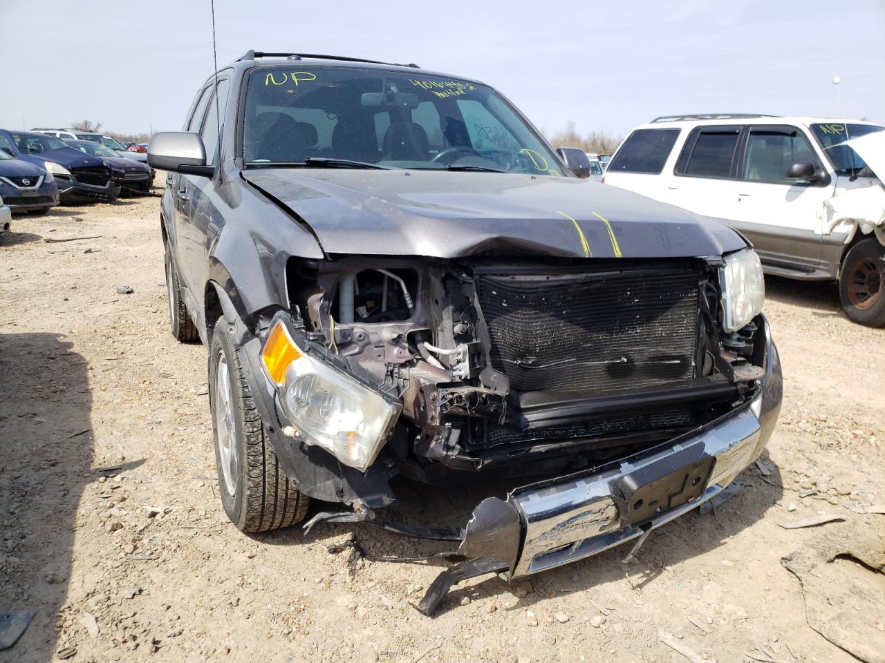 Photo 9 from auction – 2011 FORD ESCAPE LIM with VIN 1FMCU9EG0BKB24459
