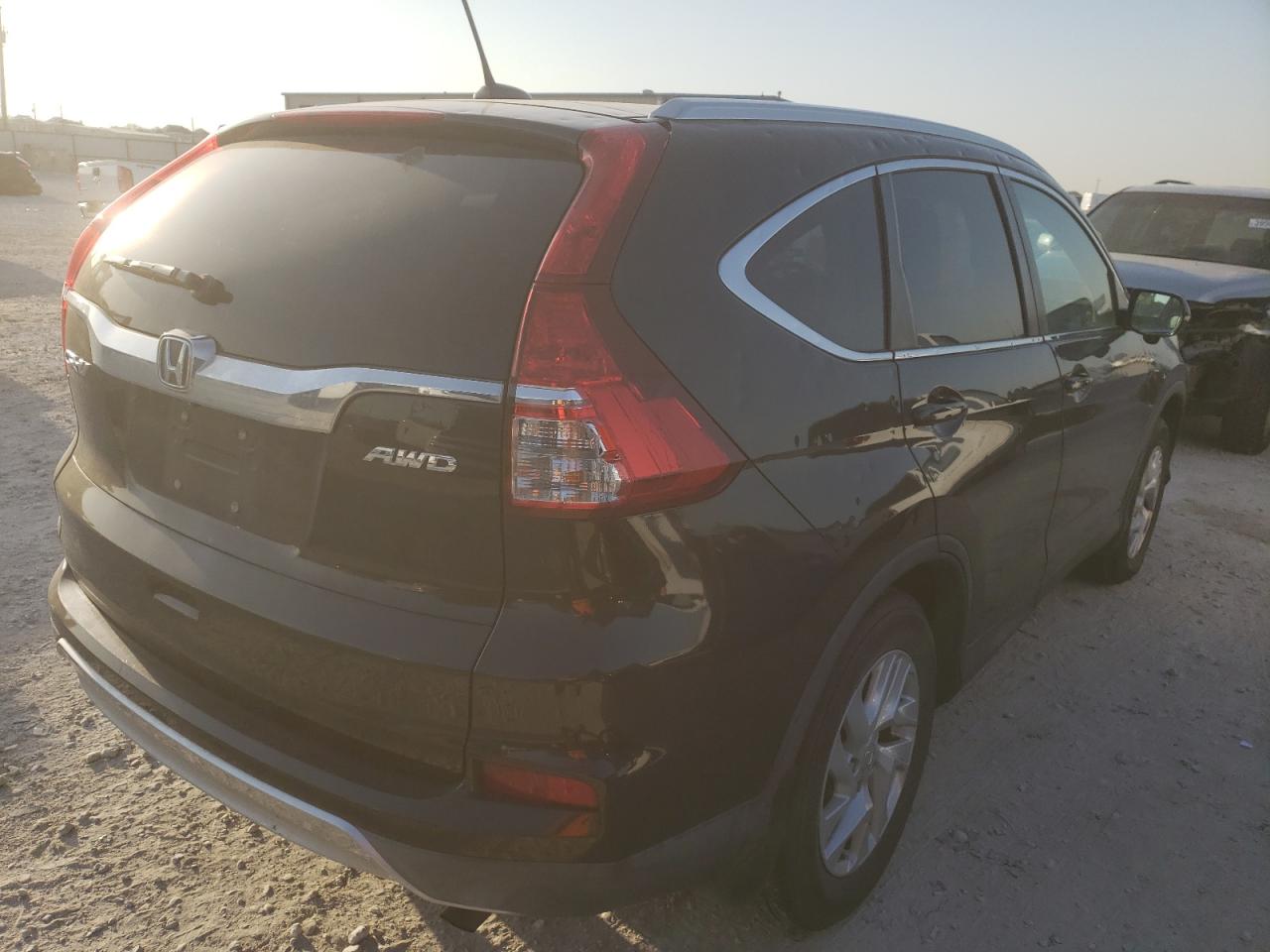 Photo 4 from auction – 2015 HONDA CR-V EXL with VIN 2HKRM4H72FH623278