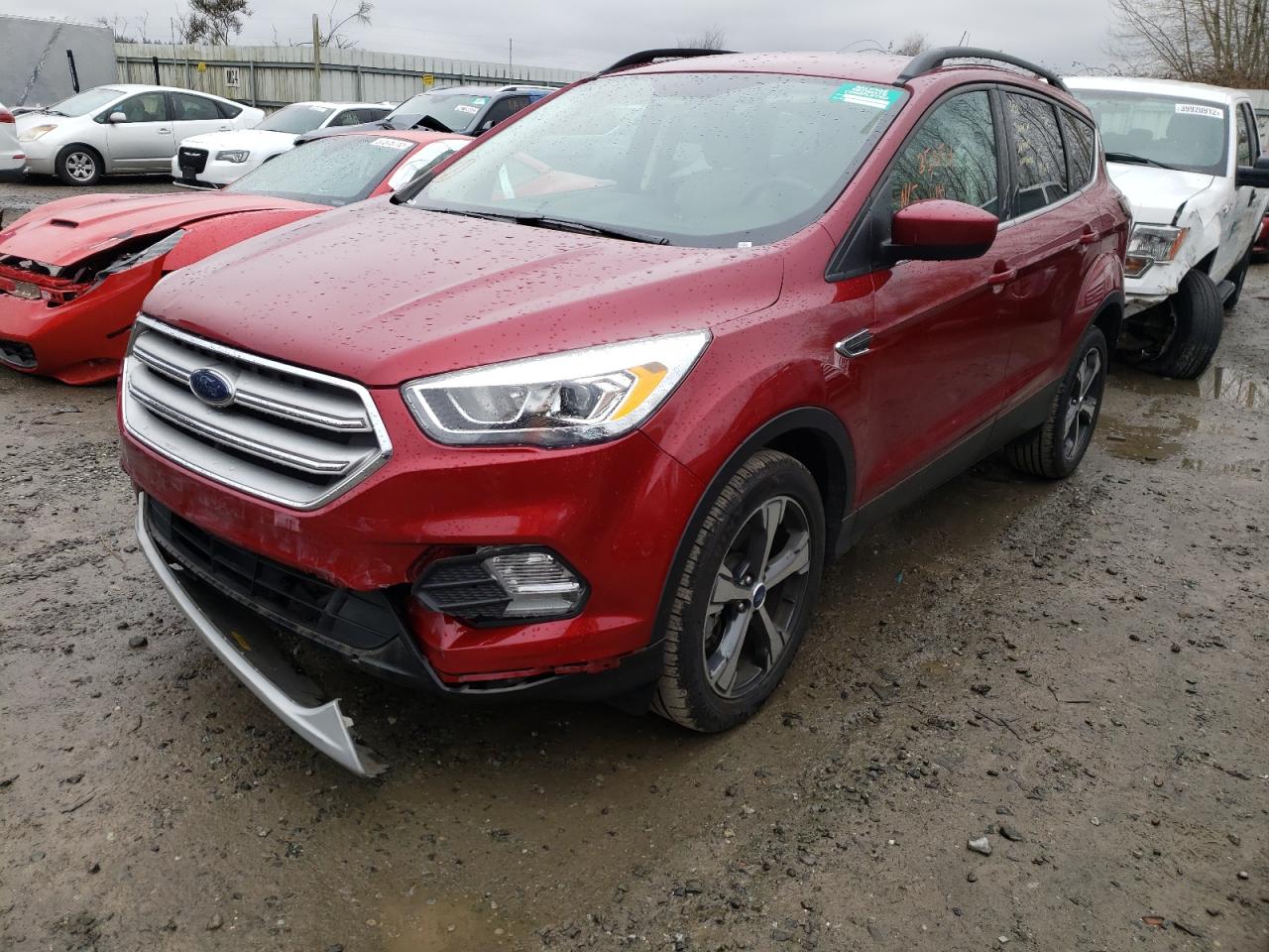 Photo 2 from auction – 2018 FORD ESCAPE SEL with VIN 1FMCU9HD8JUD44775