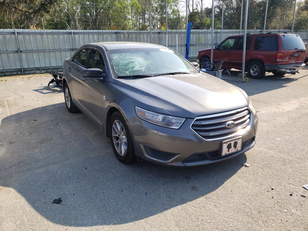 FORD TAURUS SE 2014 with VIN 1FAHP2D85EG153956 - Photo from auction