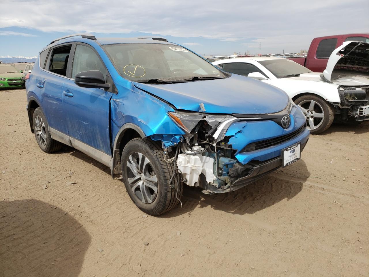 TOYOTA RAV4 LE 2017 with VIN 2T3BFREV0HW573598 - Photo from auction
