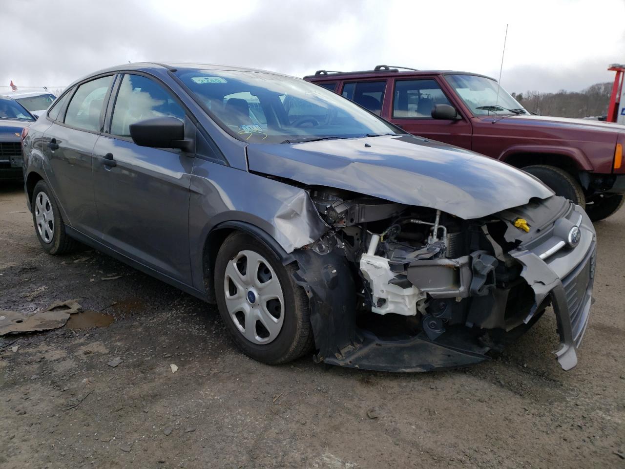 FORD FOCUS S 2013 with VIN 1FADP3E22DL128758 - Photo from auction