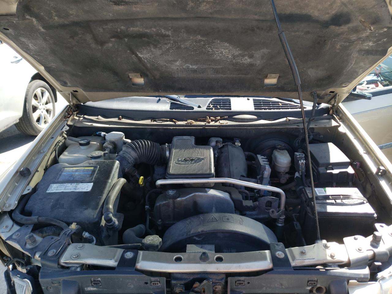 Photo 7 from auction – 2006 GMC ENVOY with VIN 1GKDT13S362204224