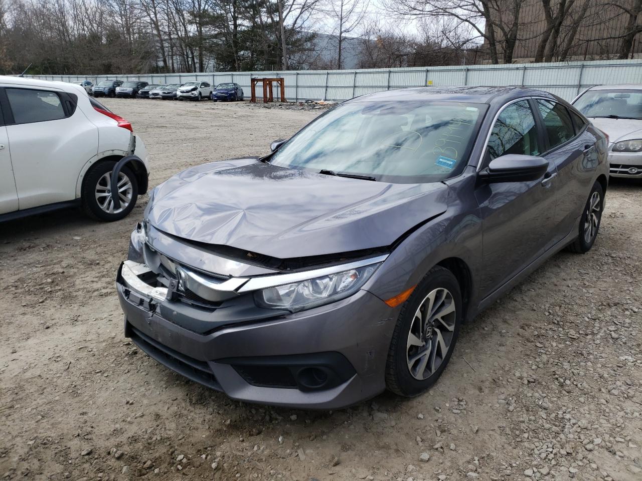 Photo 2 from auction – 2018 HONDA CIVIC EX with VIN 19XFC2F80JE204378