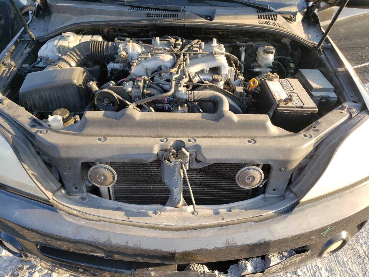 Photo 7 from auction – 2004 KIA SORENTO EX with VIN KNDJD733745186149