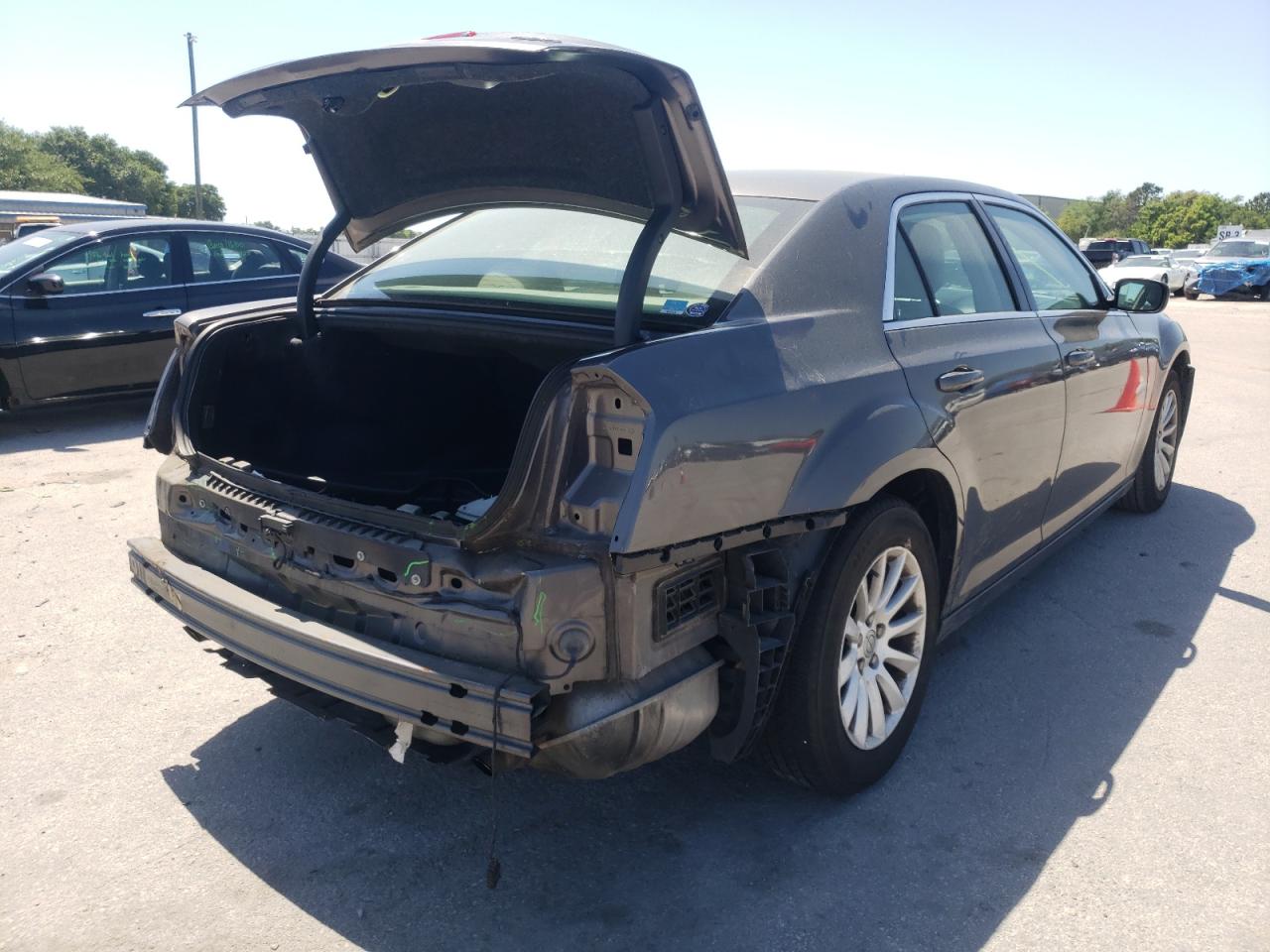 Photo 4 from auction – 2013 CHRYSLER 300 with VIN 2C3CCAAG0DH657473