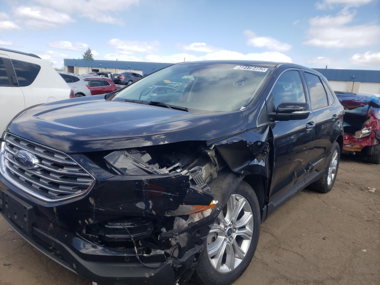 Photo 2 from auction – 2021 FORD EDGE TITAN with VIN 2FMPK4K97MBA27093