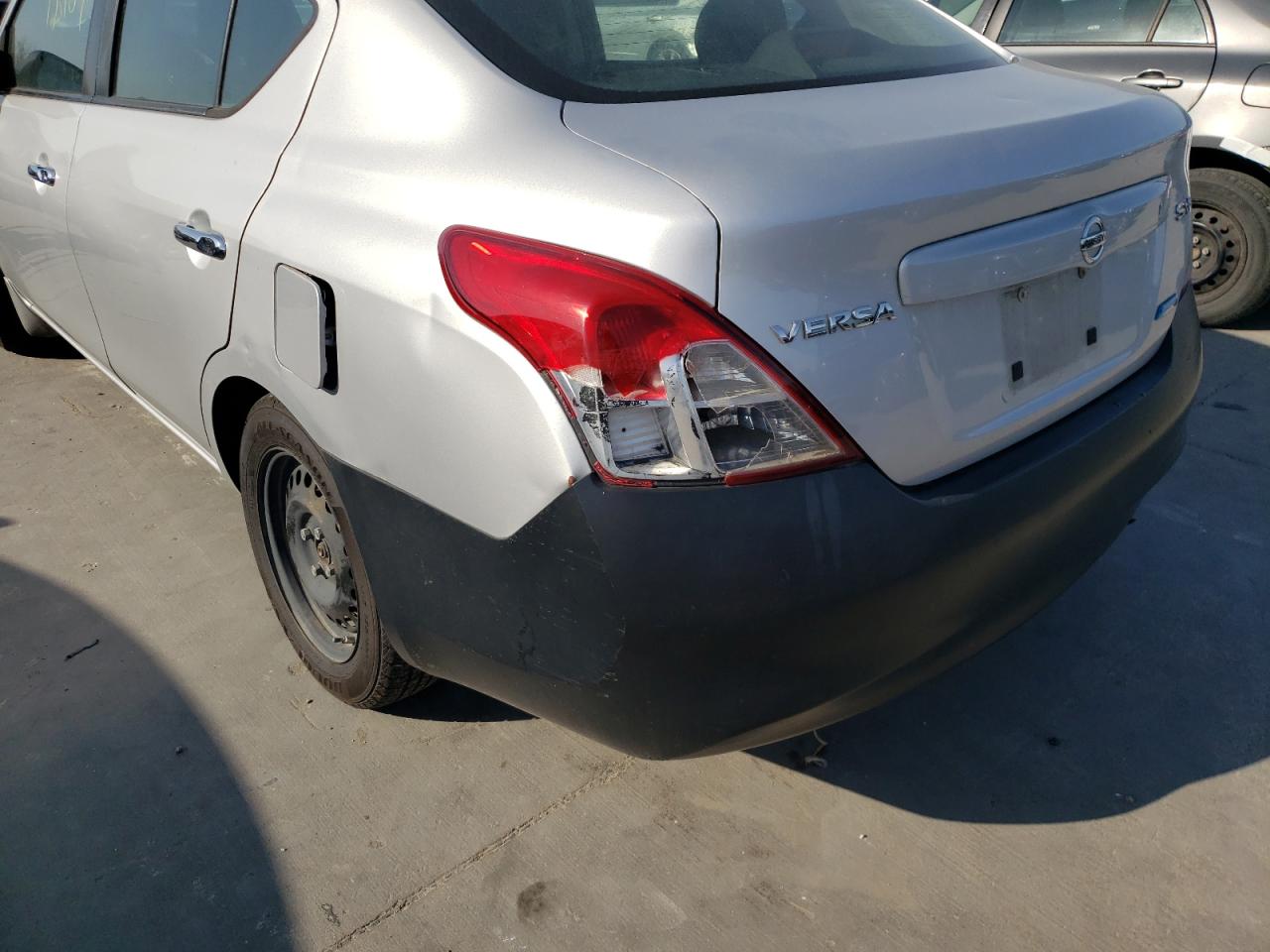 Photo 20 from auction – 2012 NISSAN VERSA S with VIN 3N1CN7AP2CL907099