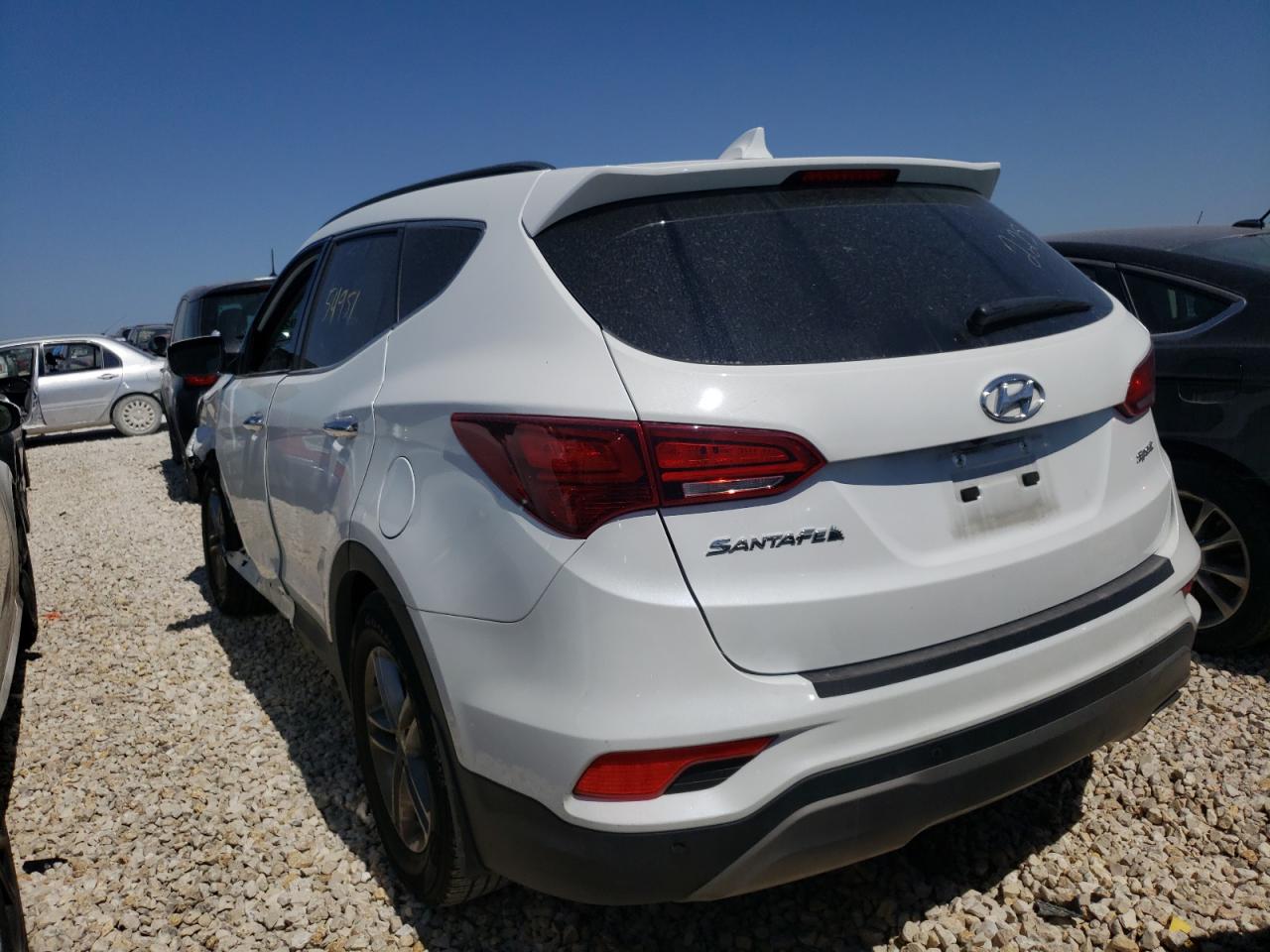 Photo 3 from auction – 2018 HYUNDAI SANTA FE S with VIN 5NMZU3LB0JH064454