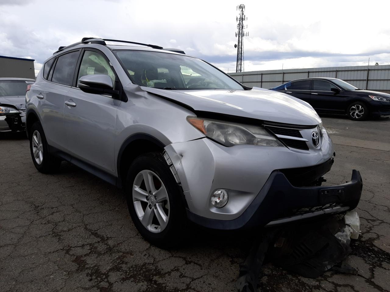 TOYOTA RAV4 XLE 2014 with VIN JTMWFREV6ED028144 - Photo from auction