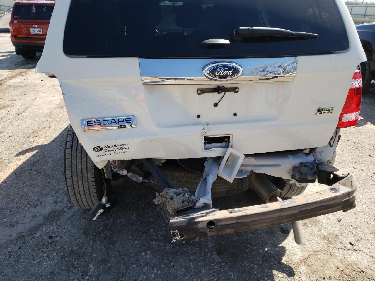 Photo 9 from auction – 2011 FORD ESCAPE LIM with VIN 1FMCU0EG3BKB33751