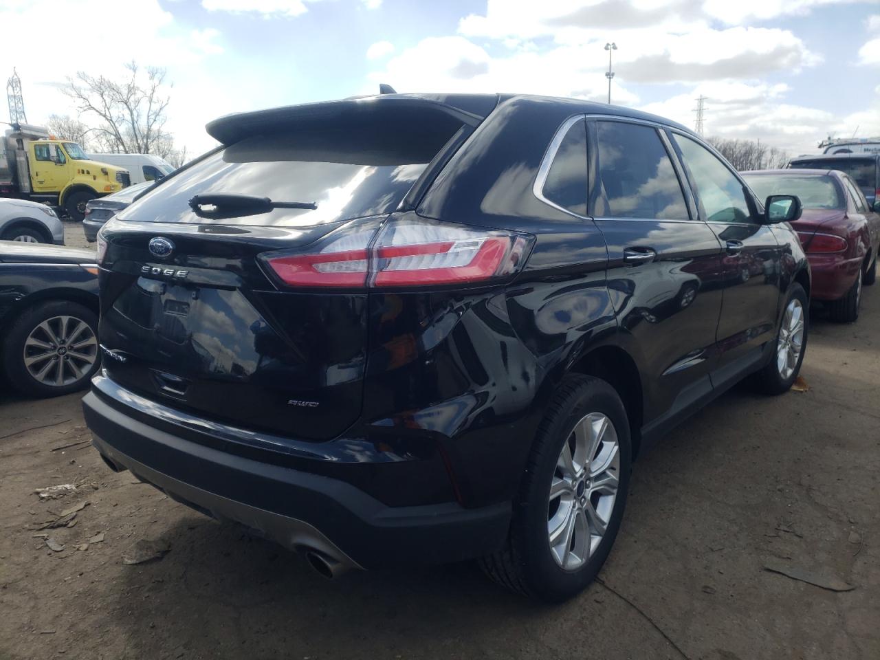 Photo 4 from auction – 2021 FORD EDGE TITAN with VIN 2FMPK4K97MBA27093