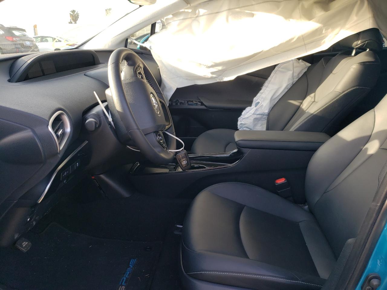 Photo 5 from auction – 2022 TOYOTA PRIUS PRIM with VIN JTDKAMFP7N3198776